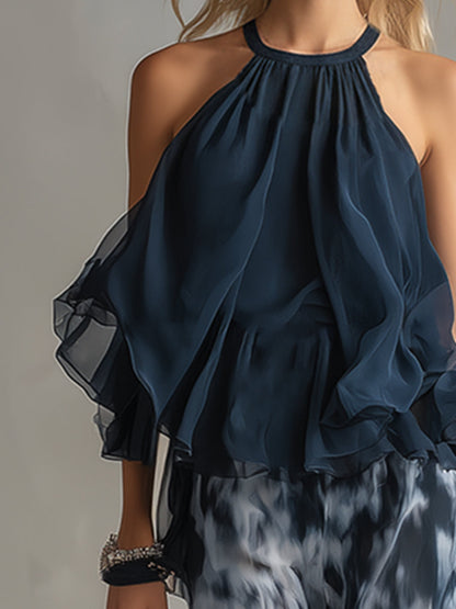 Luci | elegante en chifón con top de cuello alto y pantalones anchos estampados