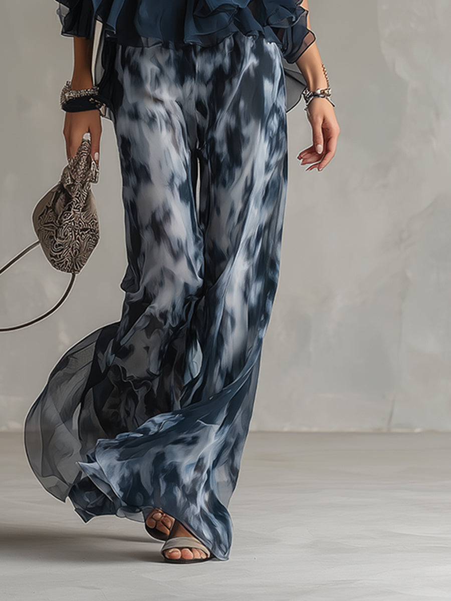 Luci | elegante en chifón con top de cuello alto y pantalones anchos estampados